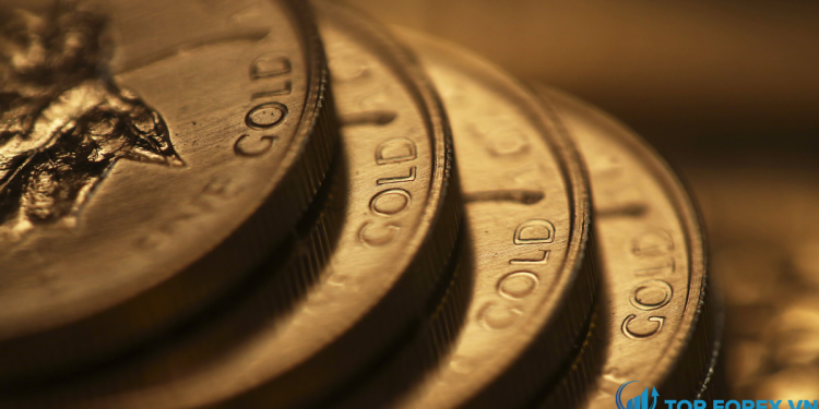 Giá vàng giảm khi Fed báo hiệu một đợt tăng lãi suất sớm hơn dự kiến