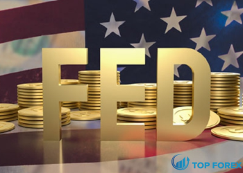 Giá vàng đảo chiều, hướng tới mức tăng hàng tuần nhờ Fed ít diều hâu hơn