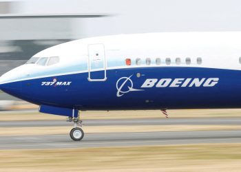 FILE PHOTO: A Boeing 737 Max aircraft during a display at the Farnborough International Airshow, in Farnborough