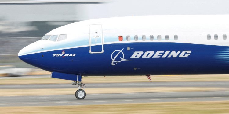 FILE PHOTO: A Boeing 737 Max aircraft during a display at the Farnborough International Airshow, in Farnborough