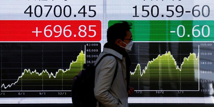 Chứng khoán châu Á trượt dốc do mâu thuẫn giữa Fed và ông Trump 